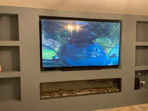 86inch LG TV fitted into a media wall